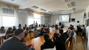 Sala wykładowa wypełniona uczestnikami spotkania